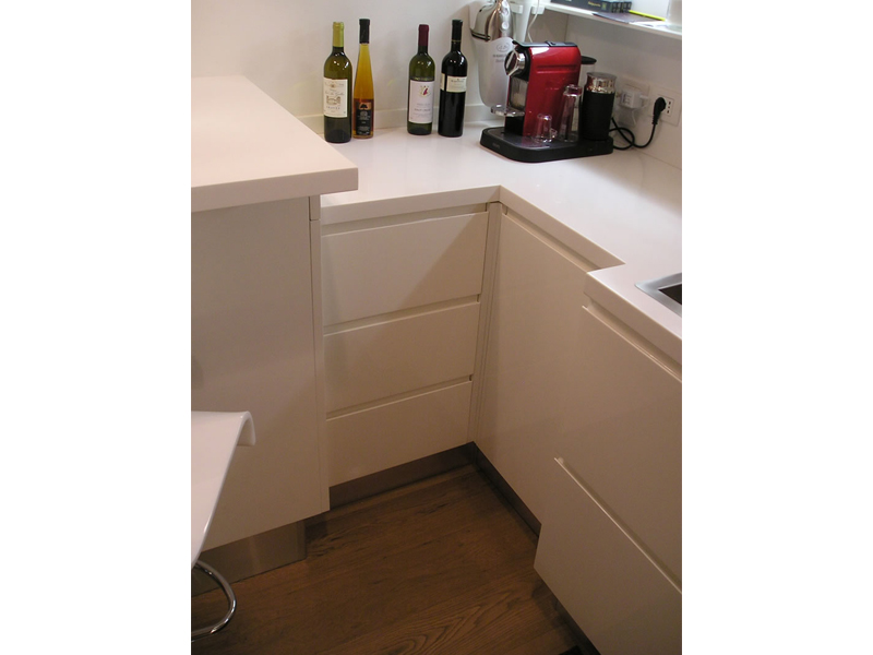 Modern kitchen cabinets, lacquer, with Corian top