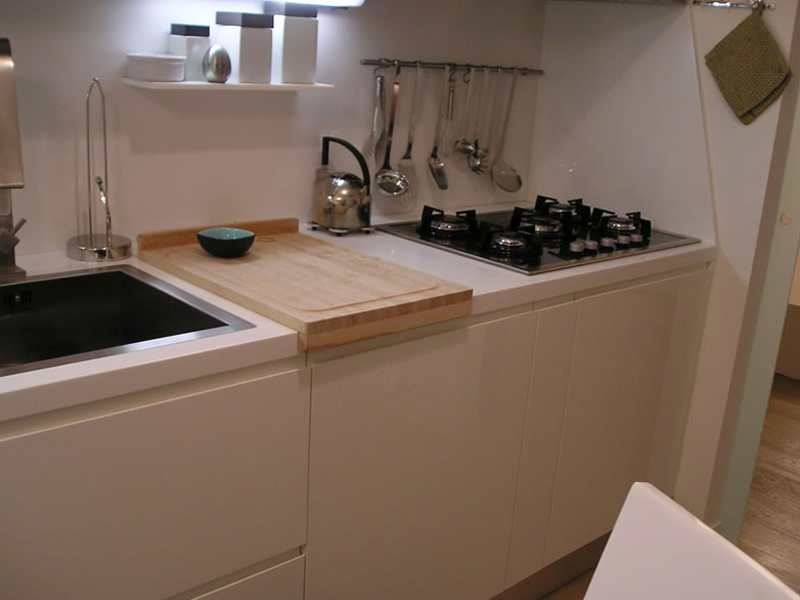 Modern kitchen cabinets, lacquer, with Corian top