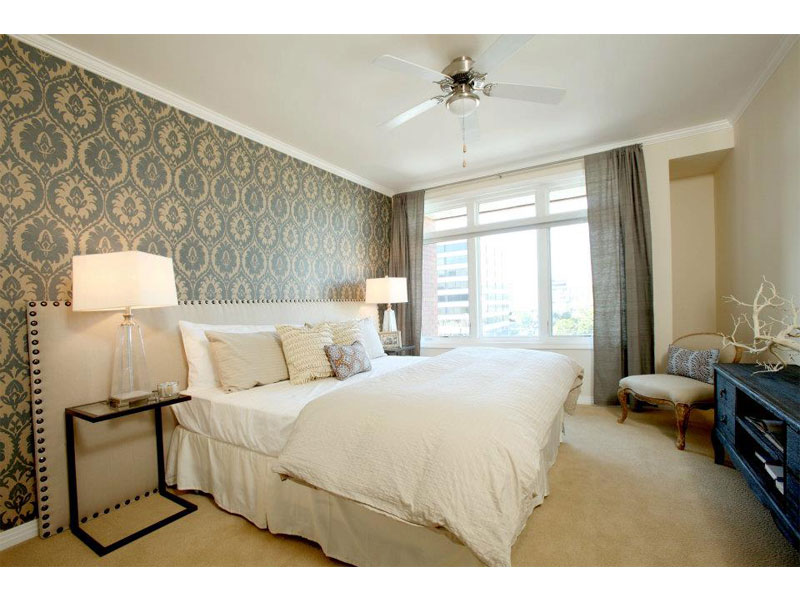 Bedroom with upholstered bed