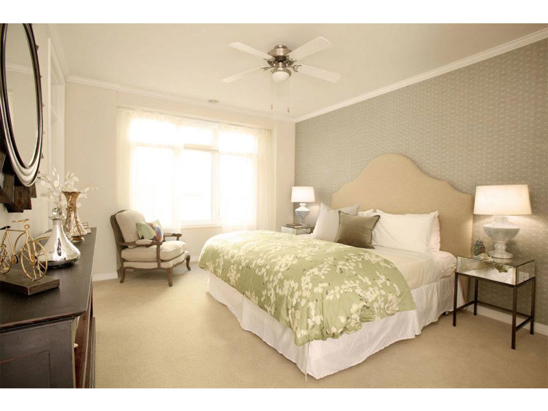 Bedroom with upholstered bed