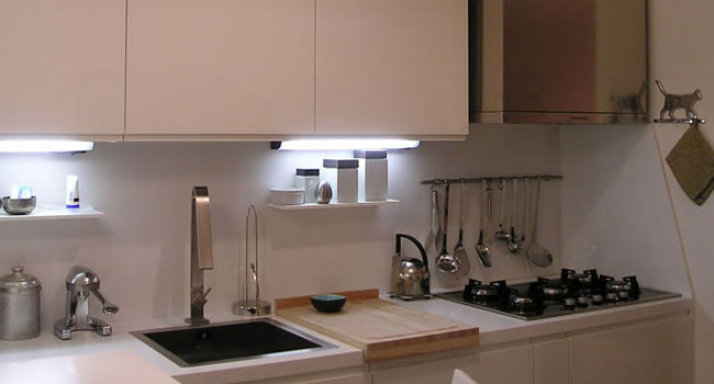 Modern kitchen cabinets, high-gloss lacquer, with a thick top
